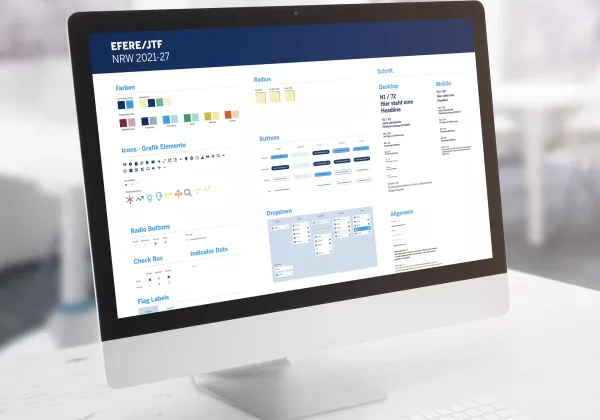 Hero EFRE Ein iMac mit der Webseite von EFRE